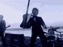 The Darkness Frankie Poullain GIF - The Darkness Frankie Poullain Bass Guitar GIFs