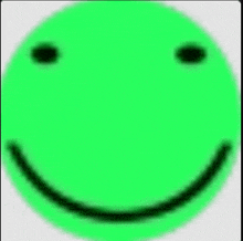 a green smiley face with black eyes and a smile on it .