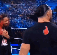 Roman Reigns Crossing Arms GIF - Roman Reigns Crossing Arms GIFs