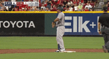 a baseball game is being played between the new york yankees and cincinnati indians