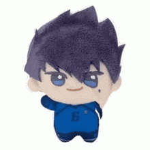 a stuffed toy of a boy with purple hair and a number 6 on his shirt .
