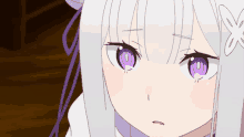 a girl with white hair and purple eyes looks at the camera
