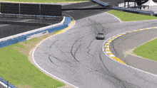 a car is going around a curve on a track