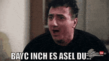 a man says bayc inch es asel du in a video