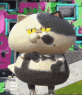a cartoon cat with yellow eyes is standing in front of a stack of pink and green boxes .