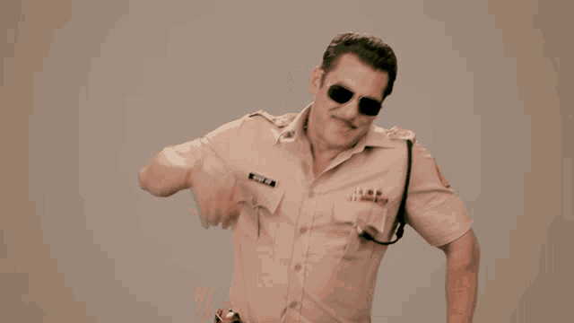 a man in a police uniform says oohh yeah in orange letters