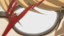 a close up of a person 's eye with a red arrow in it