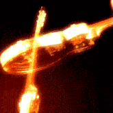 a blurred image of a violin and a banjo in a dark room