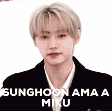 a close up of a person 's face with the words sunghoon ama a miku on it .