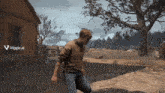 a man is kneeling down in a field with a sign that says viggle ai