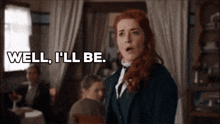 a woman says well i 'll be while standing in a room