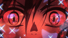 a close up of a person 's eyes with red and purple stars around them