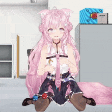 a girl with pink hair is sitting on the floor in front of a box that says " boom "