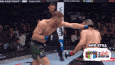 two men are fighting in a boxing ring and the words and still are on the bottom