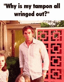 a man in a white shirt is standing in front of a pink wall and asking why is his tampon all wringed out