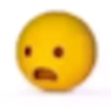 a blurry picture of a yellow smiley face with a surprised expression on its face .