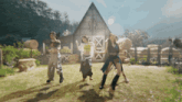 a group of women are dancing in front of a barn with the letter x on it