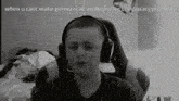 a black and white photo of a boy wearing headphones with the caption when u cant make permanent solutions for temporary problems