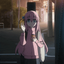 a girl with pink hair holds a can of soda in her hand