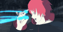 a cartoon character with red hair is holding a blue object and says huy ahhh