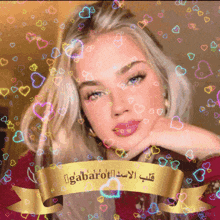 a woman is surrounded by colorful hearts and a banner that says gabarot