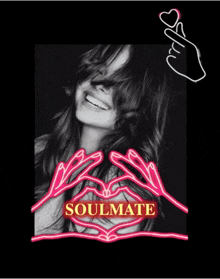 a black and white photo of a woman making a heart with her hands and the word soulmate in the corner