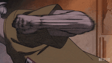 a cartoon of a man 's fist with a netflix logo in the corner