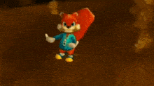 a cartoon squirrel is standing on top of a rock in a video game .