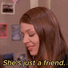 a woman says she 's just a friend in yellow