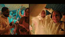 a man with a beard is dancing with a woman