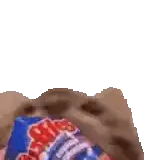 a person is holding a bag of m&m 's candy .