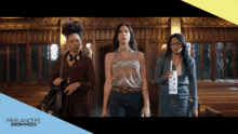 three women are walking in a church with the words " freelancers anonymous " on the bottom