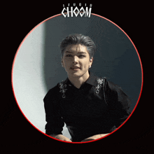 a man in a black shirt is in a circle with the word choom