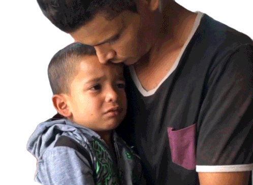 father and son hugging crying