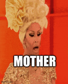 a drag queen wearing a gold dress and a yellow flower in her hair says mother .
