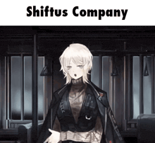 a woman in a black jacket and sweater is standing in a room with the words shiftus company written above her .
