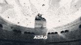 a black and white drawing of a stadium with the word adao on it