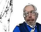 a man wearing glasses and a blue shirt