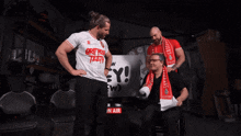 a man wearing a shirt that says ' ey ! ' on it