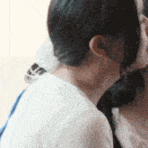 a close up of a woman 's neck and neckline
