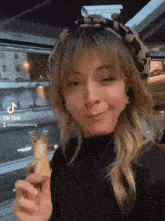 Lindsey Stirling Bread GIF - Lindsey Stirling Bread Looking Around GIFs