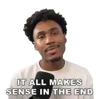 a man says it all makes sense in the end in front of a microphone