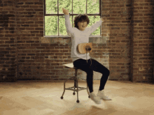 Win Spin - Millie Bobby Brown X Converse Gif GIF - Millie Bobby Brown Excited Yay GIFs