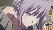 a girl with purple hair and pink eyes is looking at a plate of food