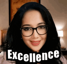 a woman wearing glasses is smiling and the word excellence is behind her
