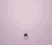 a picture of a desk with a computer and a chair