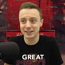 a man wearing a black t-shirt that says great