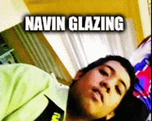 a picture of a young man with the name navin glazing on the bottom