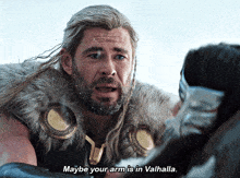 a man in a fur coat says " maybe your arm is in valhalla .. "