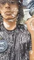 a person wearing a shirt that says ' edel ' on the front